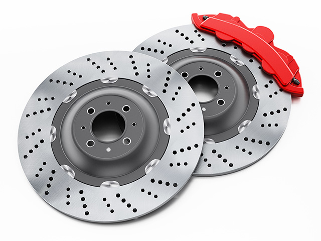 Car brake discs and red calipers isolated on white background. 3D illustration